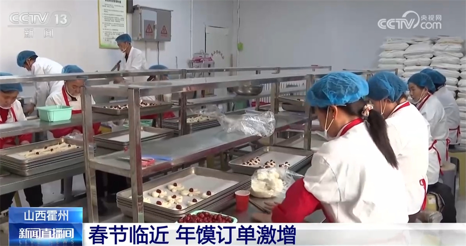 才下“舌尖”又上“心头” 春节临近年味浓 处处洋溢欢声笑语(图4)